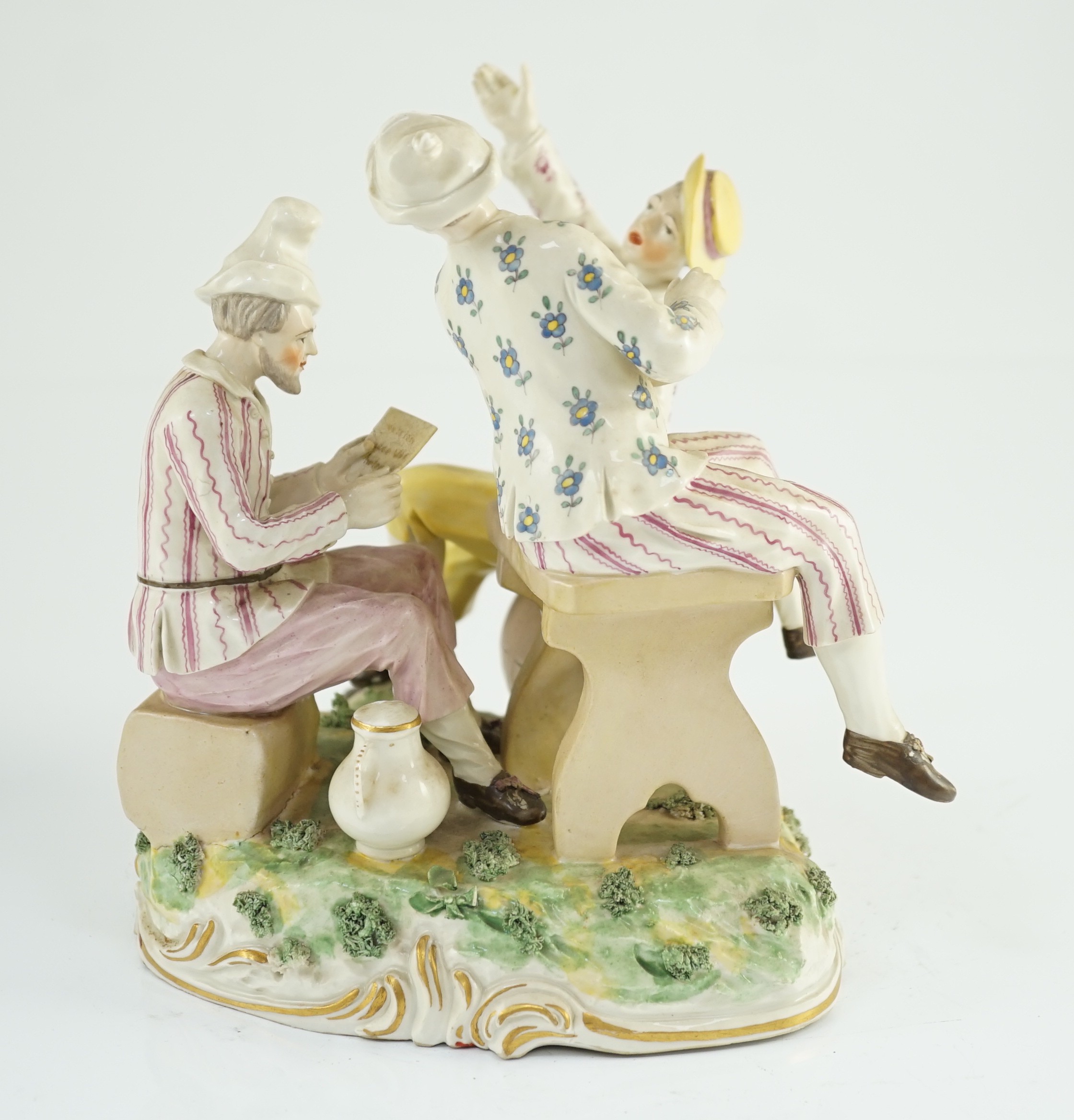 A Frankenthal porcelain group of three carousing men, c.1770-75, modelled by Karl Gottlieb Lück, 20cm high, 19cm wide, restored letter, Provenance - purchased from Winifred Williams, Eastbourne/London before 1970.